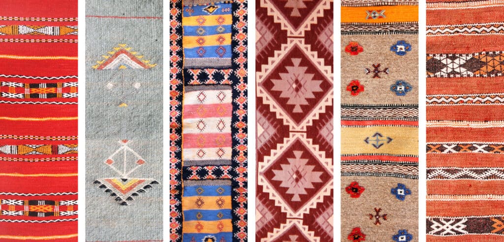Detalle de alfombras tradicionales amazigh con motivos geométricos, usados como formas de expresión simbólica y transmisión cultural entre mujeres